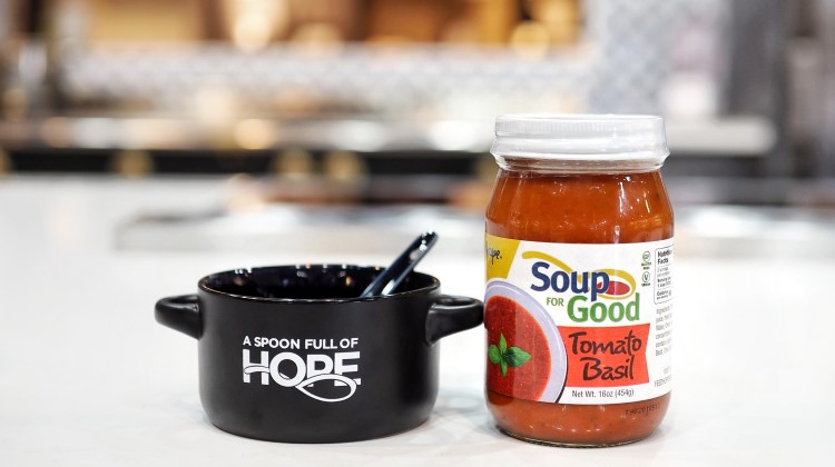 A Spoon Full of Hope tomato basil soup in a jar.