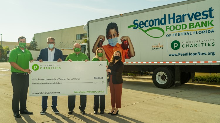 Public employees present big check to Second Harvest Food Bank of Central Florida. 